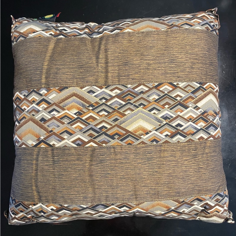 Geometric Patterned Brown Pillow